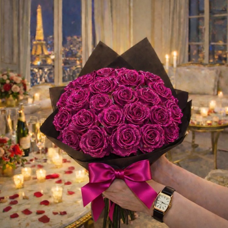 A stunning bouquet of deep magenta glitter roses tied with a dark pink ribbon, held in a warm, romantic atmosphere.
