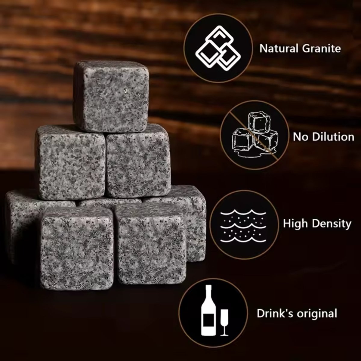 A close-up of the natural granite whiskey stones from the Kouvr set, with icons highlighting features like no dilution and high density for optimal chilling.
