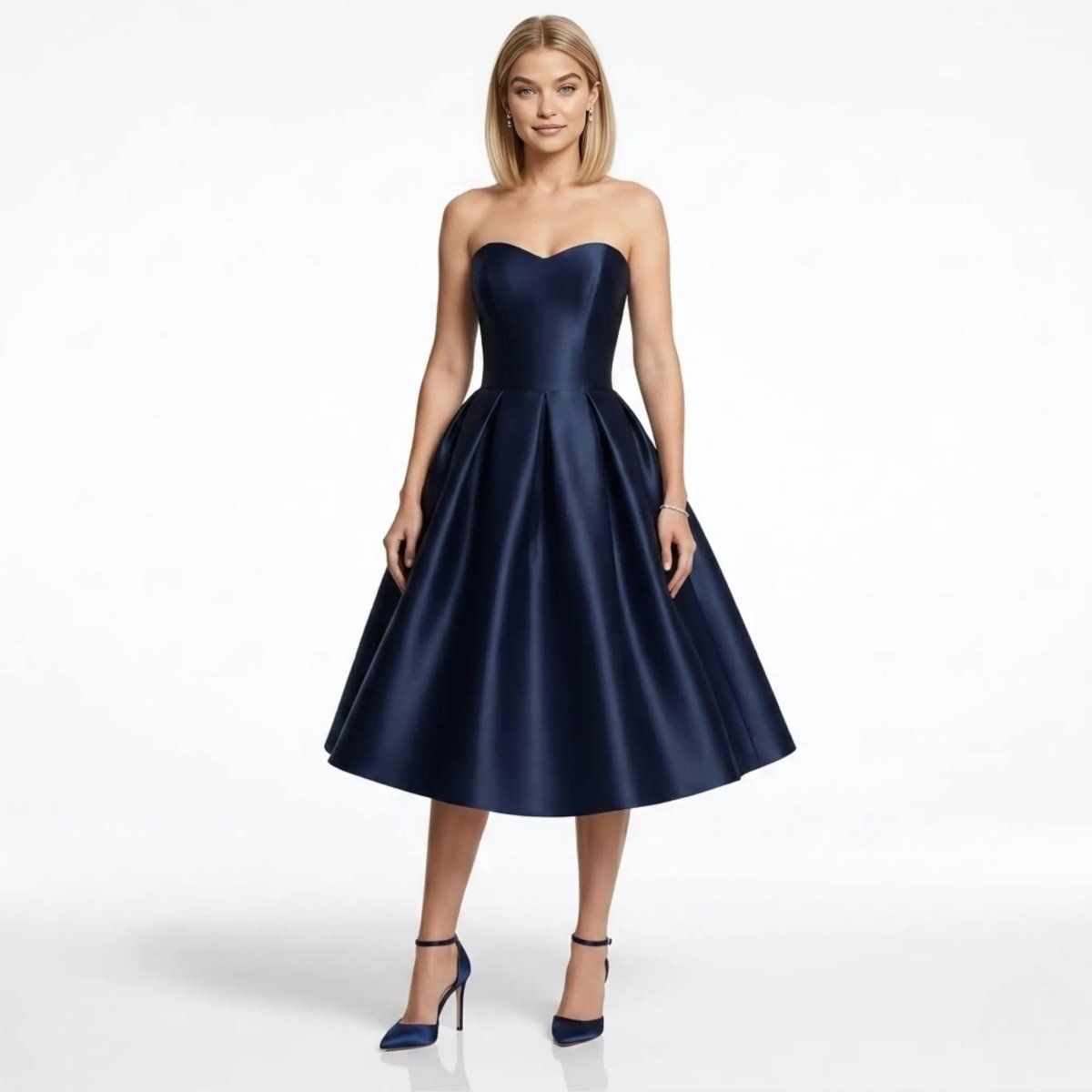 Elegant navy satin strapless midi dress with sweetheart neckline front view by Kouvr.