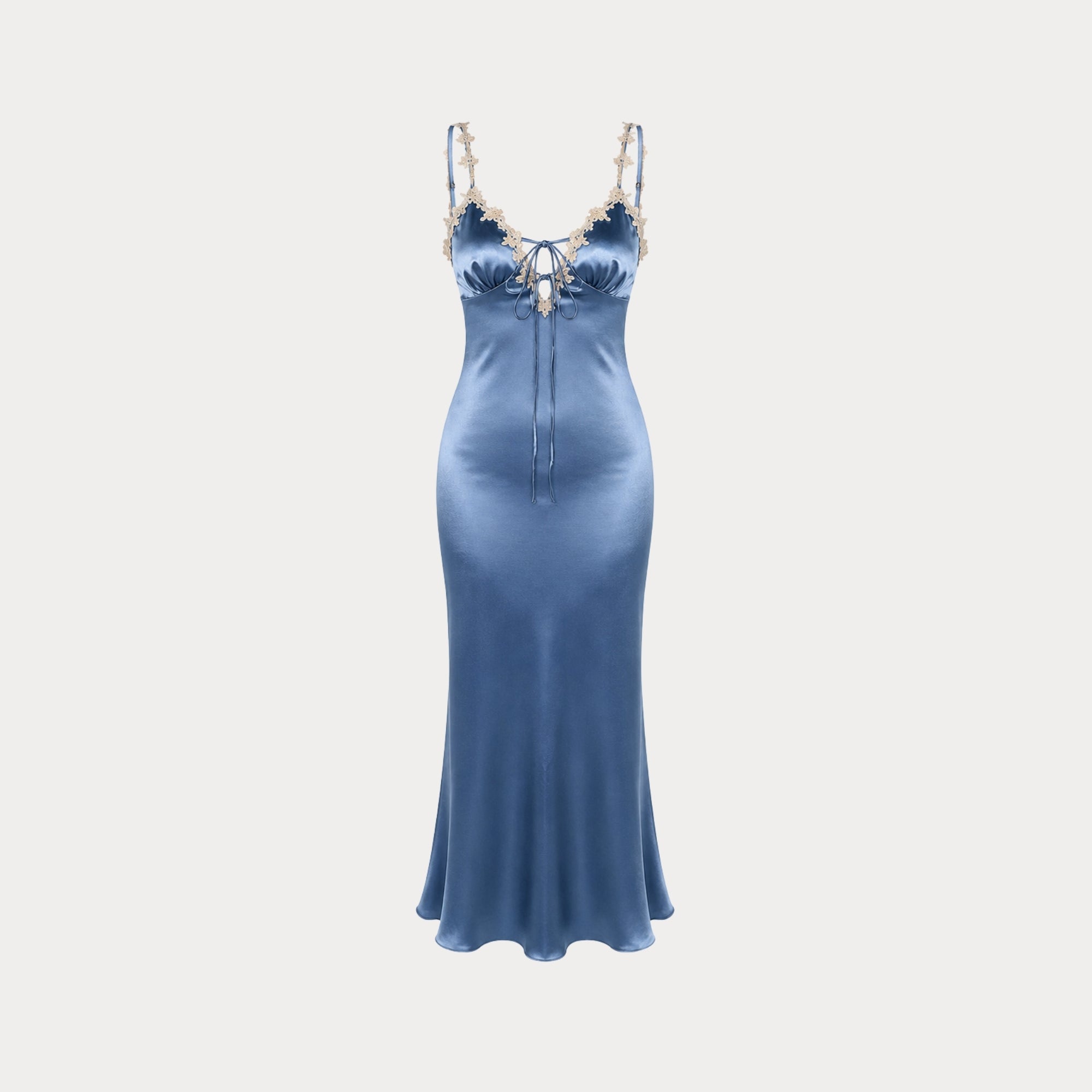 Isolated view of slate blue satin slip dress highlighting delicate floral lace neckline and bust gathering.