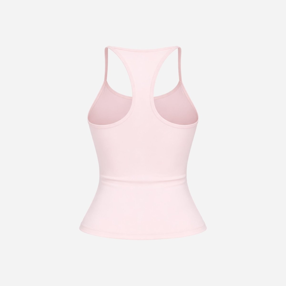 Flat lay studio shot of the back of a pale pink racerback athletic tank top showing strap detail.