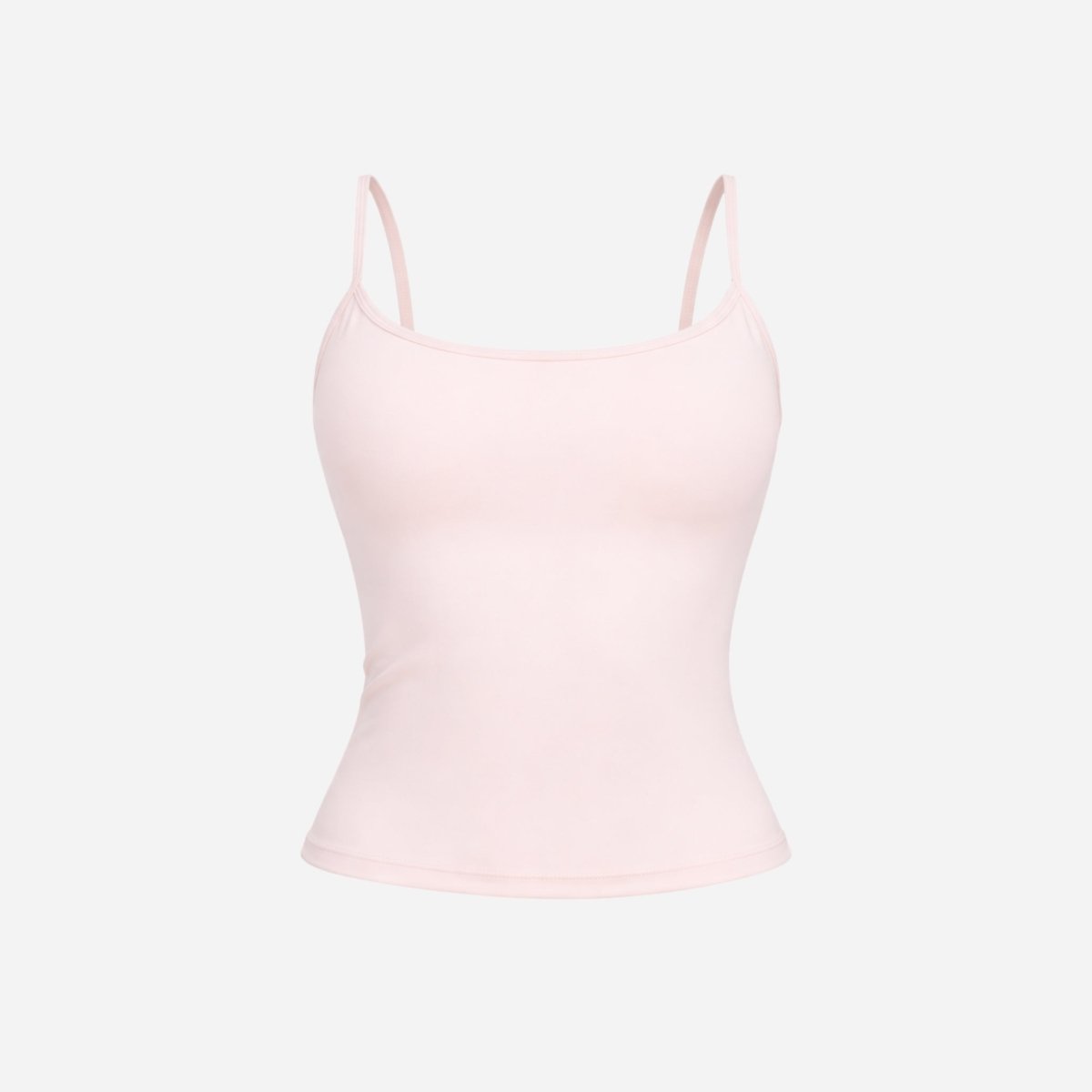 Flat lay studio shot of pink scoop neck camisole tank top activewear piece.
