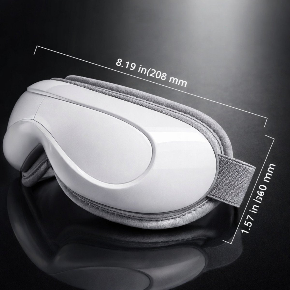 Dimensions of the ergonomic KVOUR eye massager measuring 8.19 inches in length by 1.57 inches in width on a dark reflective surface.