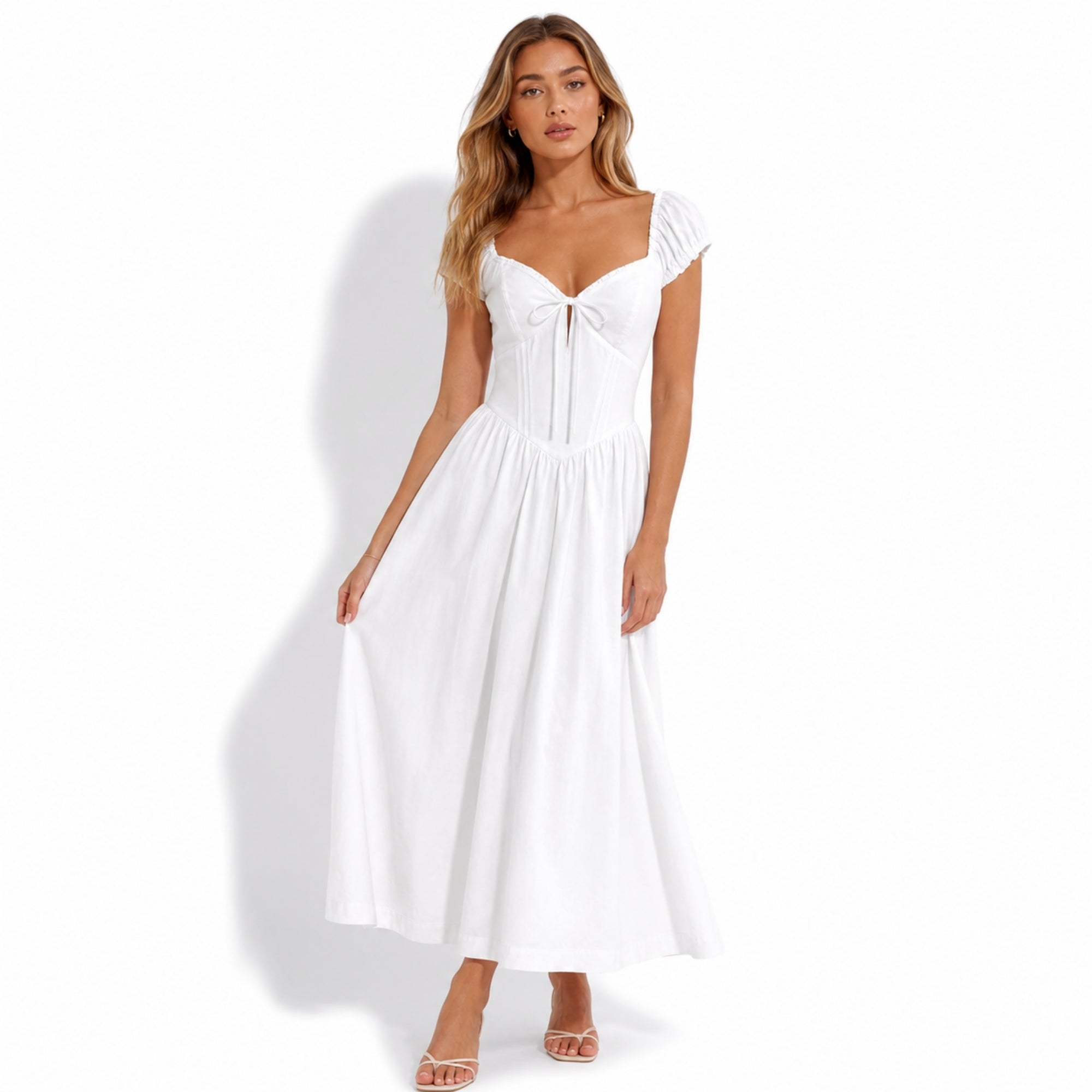 Elegant white sweetheart neckline summer dress featuring ruched cap sleeves and vintage silhouette