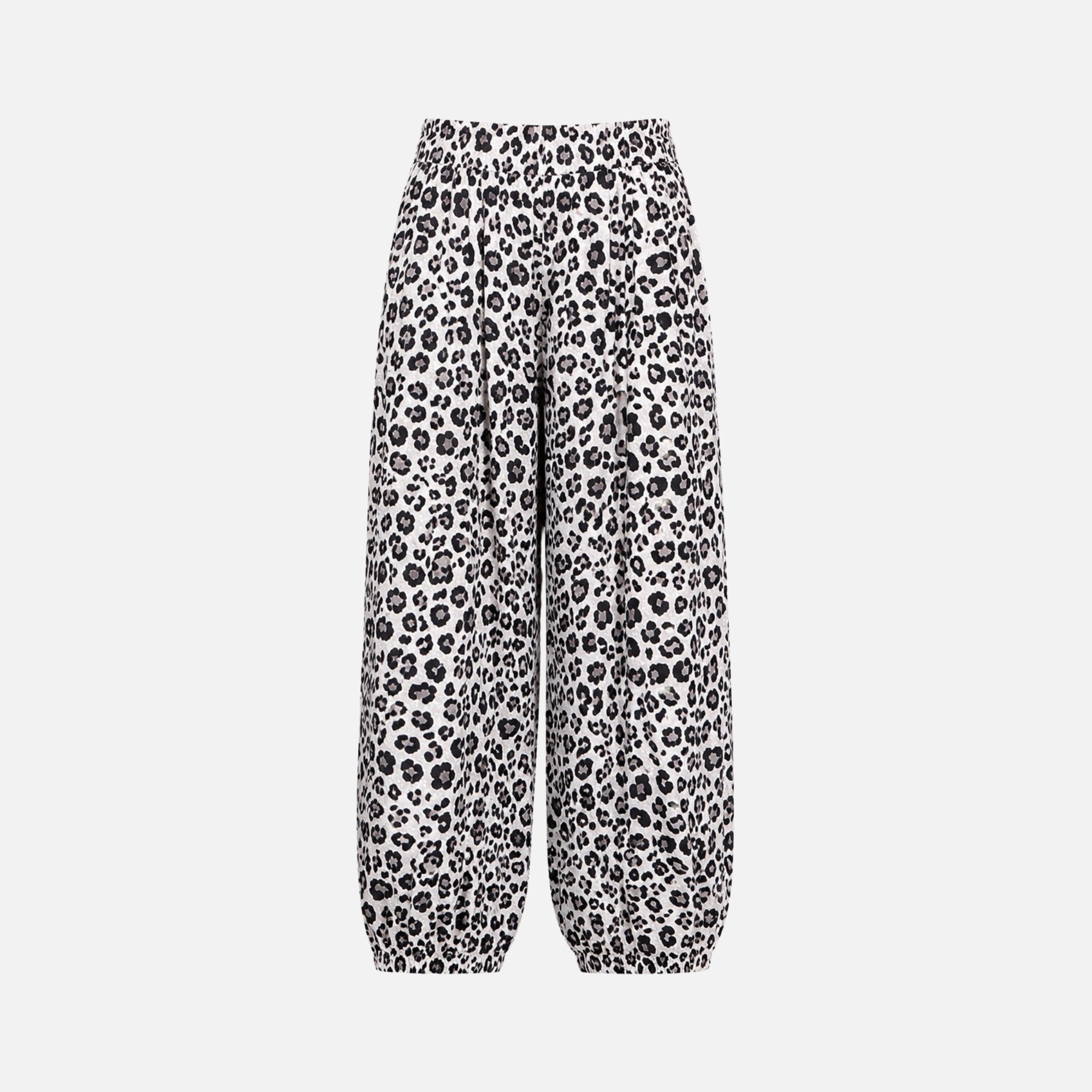 Flat lay front view of relaxed fit leopard print dress pants showing wide leg cut and premium fabric texture