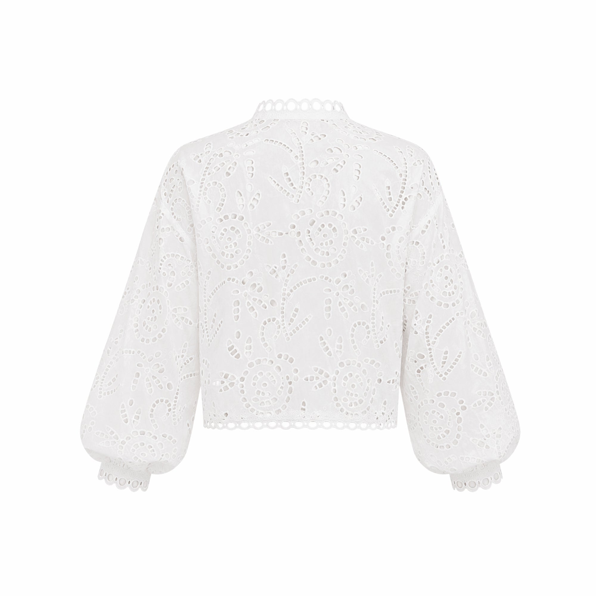 Flat lay back view showcasing the delicate cutwork and scalloped hem of the Kouvr white lace top.