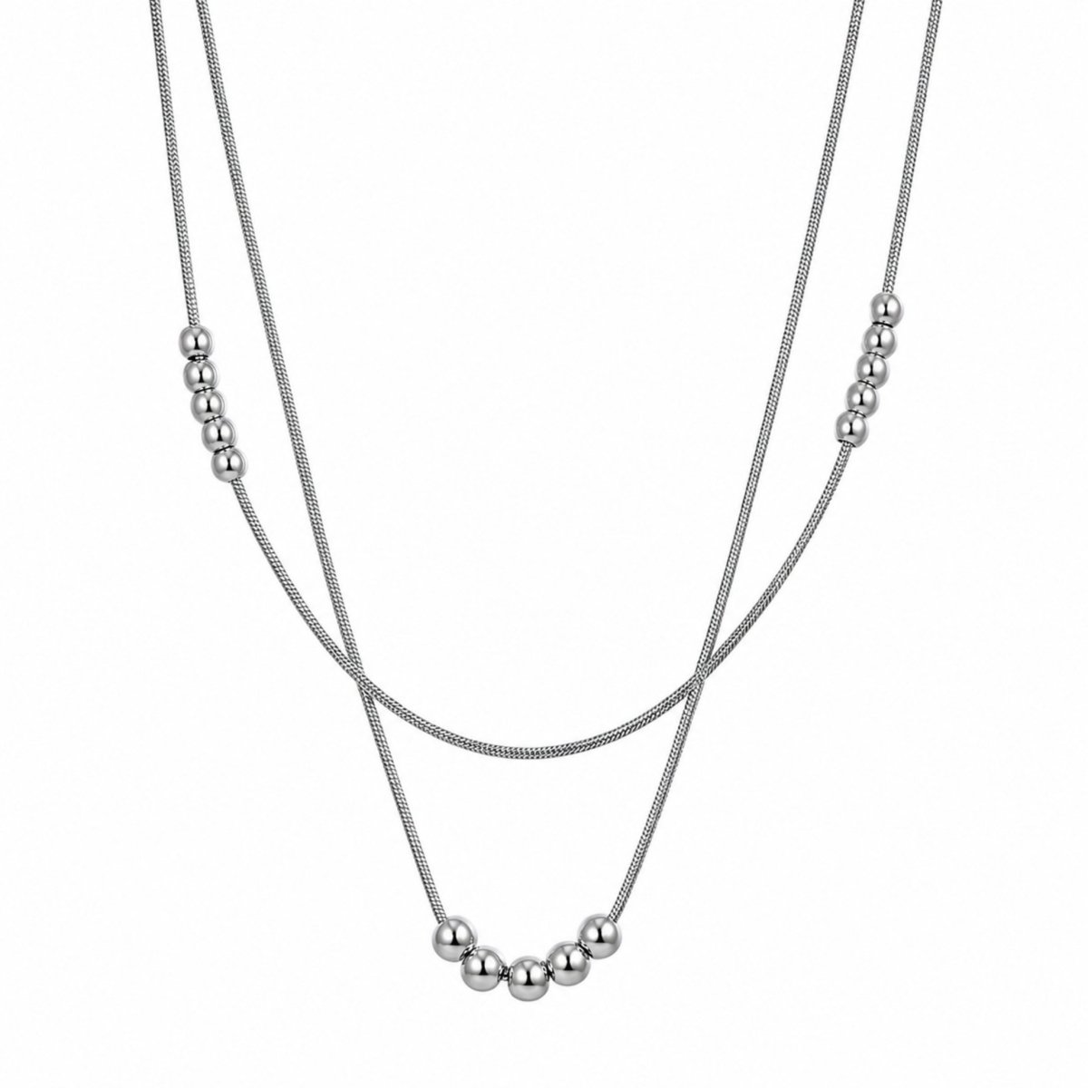 Close up of minimalist double layered snake chain necklace in polished silver featuring small and large metallic sphere accents.
