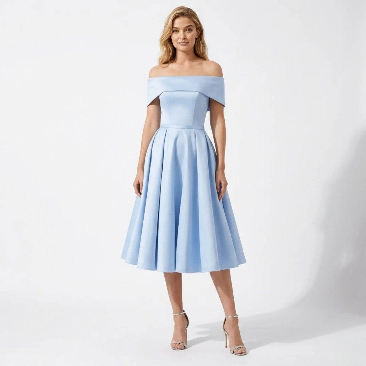 Woman wearing Kouvr sky blue off the shoulder A-line midi cocktail dress standing facing forward