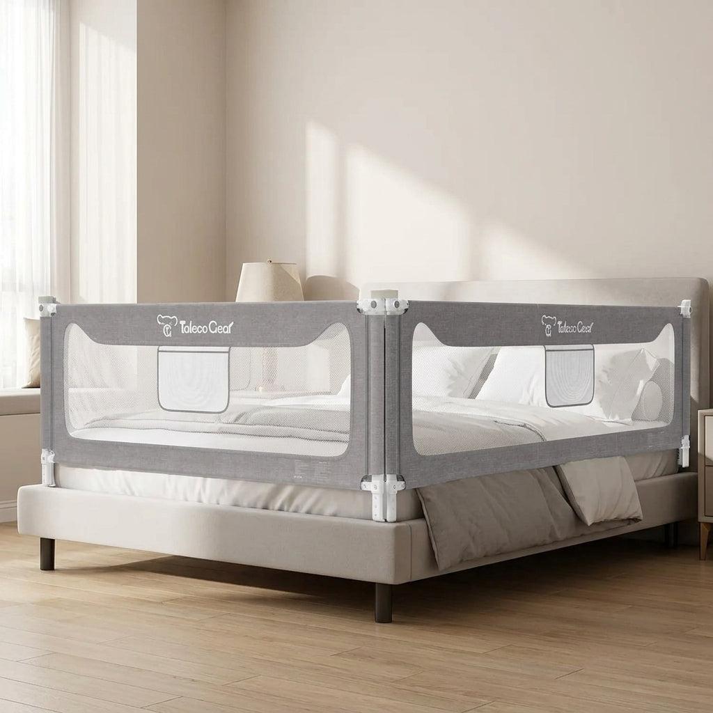 Kouvr SlumberHaven Guardian extra tall toddler bed rail guard arranged in an L-shape configuration on a contemporary platform bed with neat neutral linens.