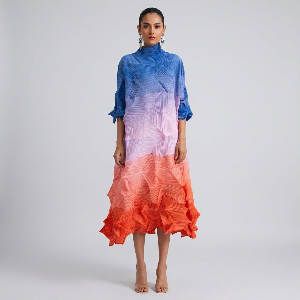Front view of the Kouvr sunset ombre color block pleated midi dress featuring a high neck and architectural plisse texture.