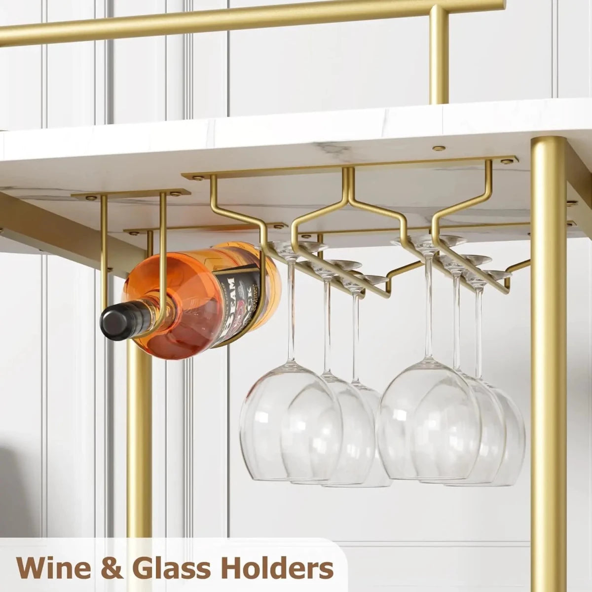 Close up of gold metal under-shelf storage holding a wine bottle horizontally and hanging stemmed wine glasses securely.