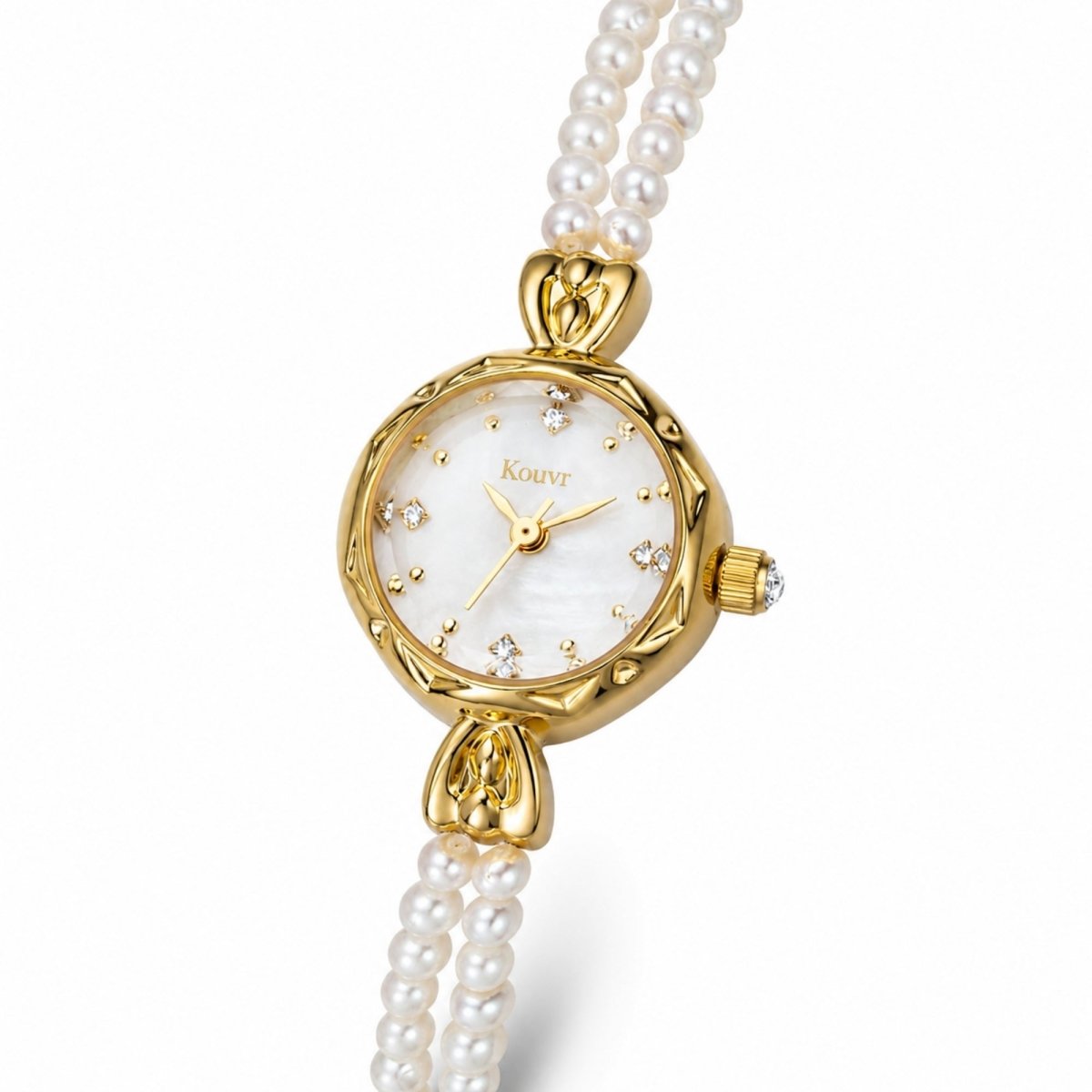 Angled view of the vintage style Kouvr women's watch highlighting the gold stainless steel case and crystal hour markers.