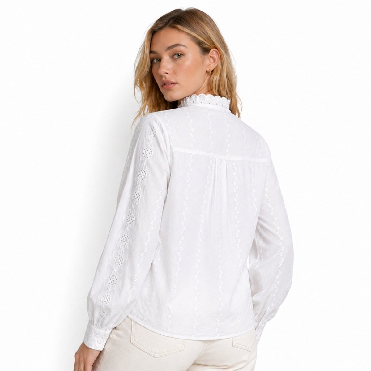 Back view detailing the yoke and gathers of the Kouvr white high neck eyelet shirt