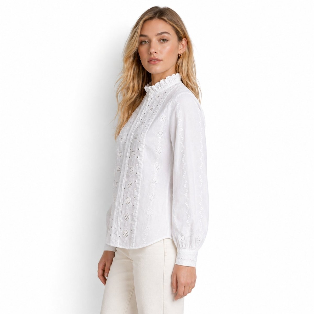 Side profile of woman modeling the Kouvr white embroidered cotton victorian top