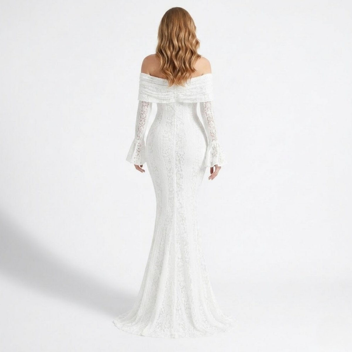 Back view of Kouvr white lace formal maxi dress displaying off shoulder neckline, ruched back bodice, and floor length bridal hem