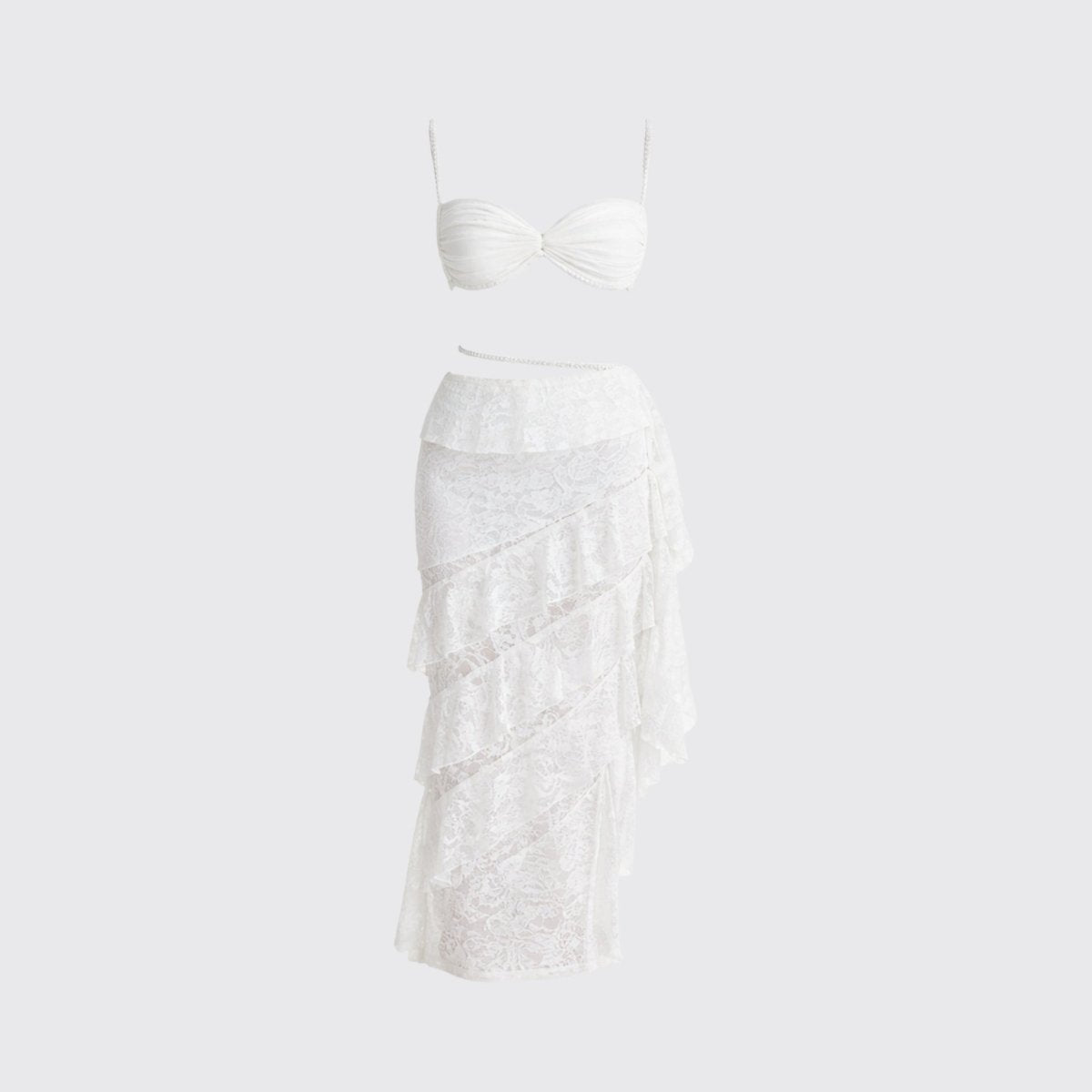 Front flat lay product shot of the white sweetheart bralette and tiered lace maxi skirt co-ord set.
