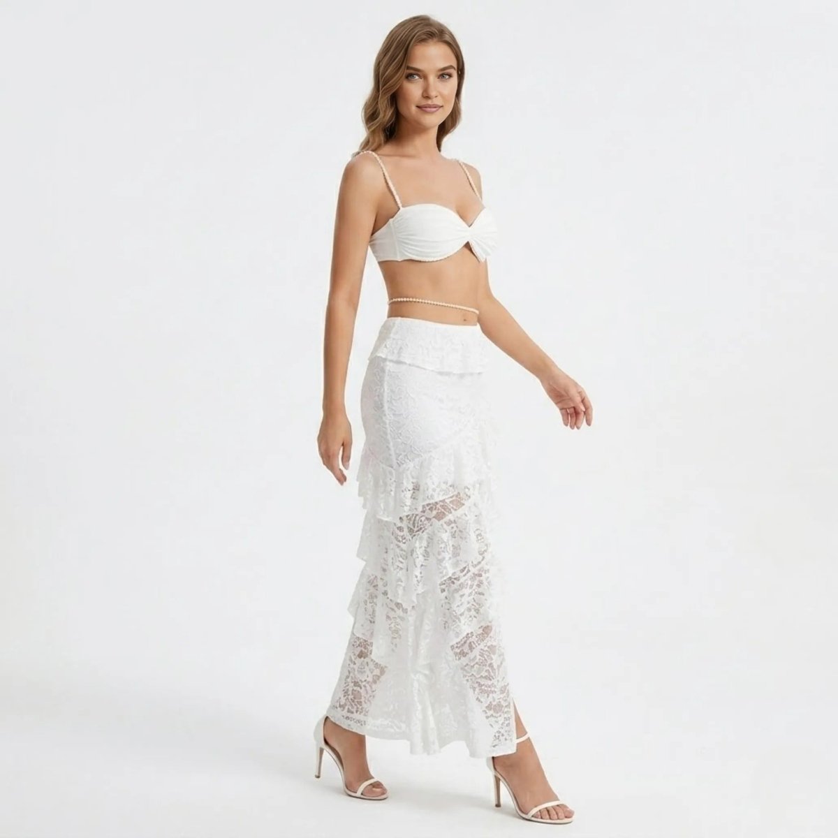 Side angle view showcasing the sheer lace panels and cascading ruffles of the Kouvr white summer bridal matching set.