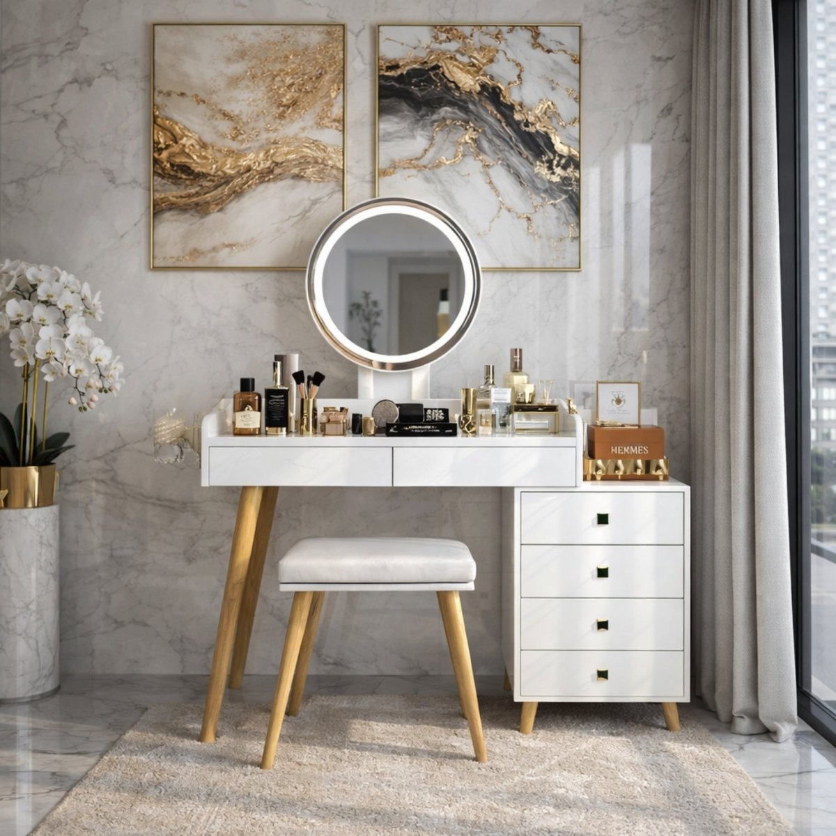 Modern white Kouvr makeup vanity desk featuring a lighted round LED mirror, glass tabletop, and matching cushioned stool in a luxury marble bedroom.