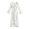 Flatlay of the white ruffle tie-front maxi cover up showing cascading ruffle details and textured fabric.