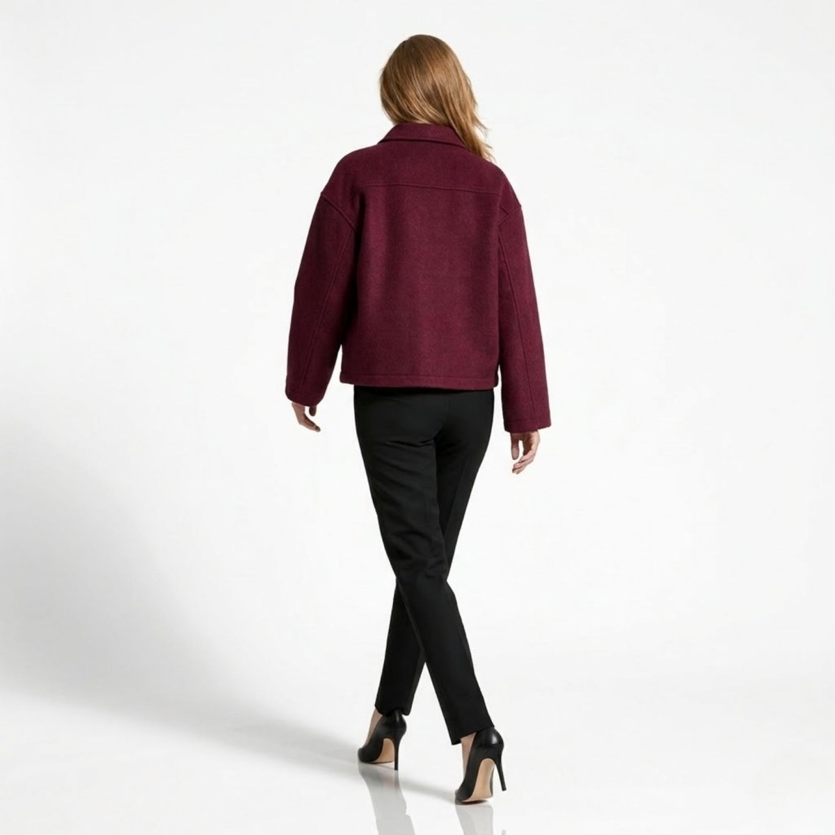 Back view of Kouvr maroon drop shoulder short wool coat on female model