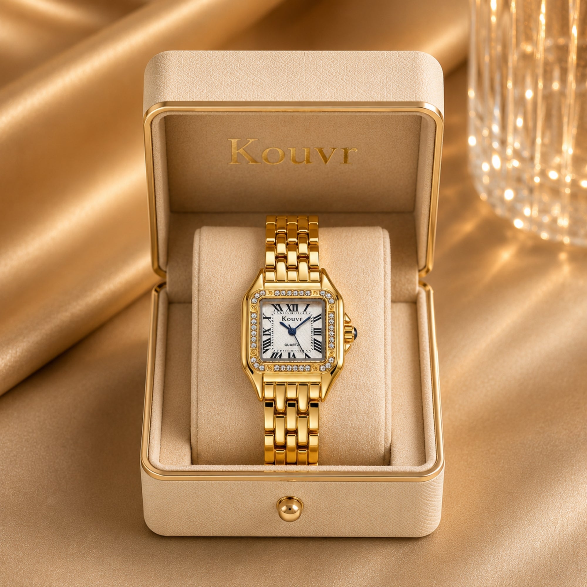 Kouvr women's luxury classic square gold watch with Roman numerals displayed in a premium beige velvet presentation box.