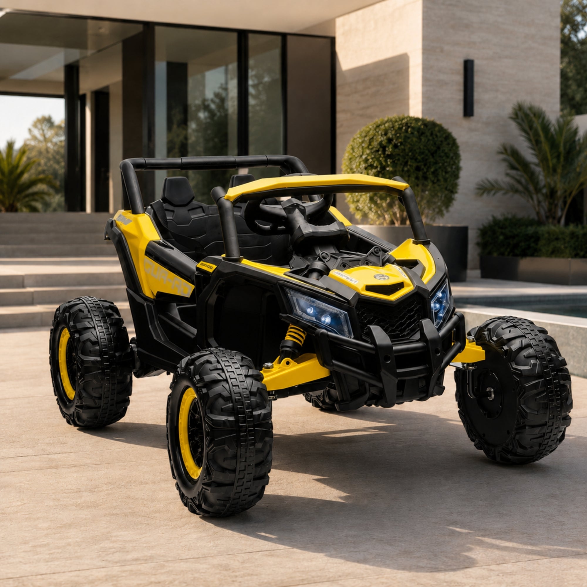 A bright yellow 24V kids' safari jeep buggy parked in front of a modern house, showing off high-grip tires and dual seating.