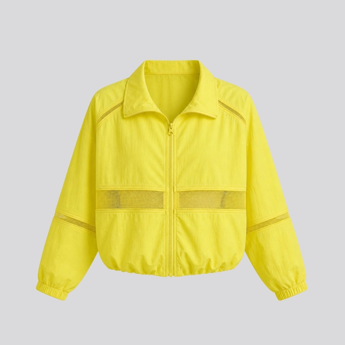 Studio flat lay of neon yellow zip-up lightweight jacket featuring fold-over collar and sheer mesh strip across the chest.