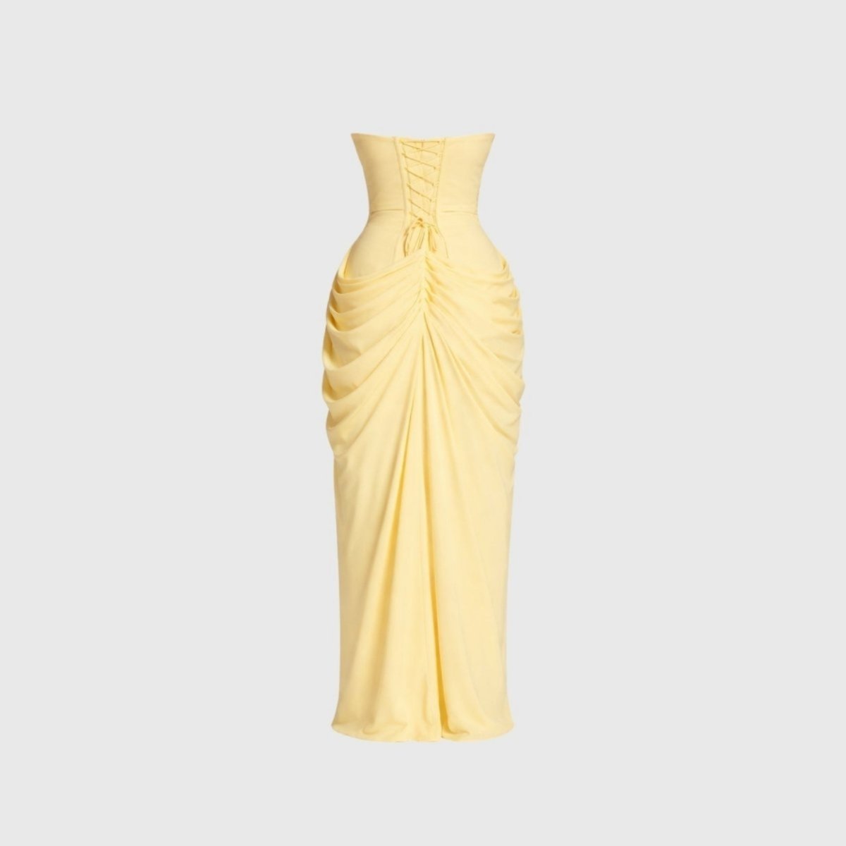 Back flat lay studio view of pale yellow formal dress highlighting the adjustable lace-up corset tie detail.