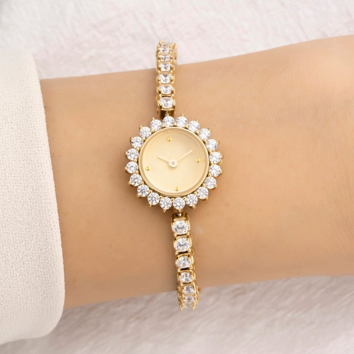 A woman wearing the elegant Zenny  vintage gold kouvr  crystal bracelet watch. 