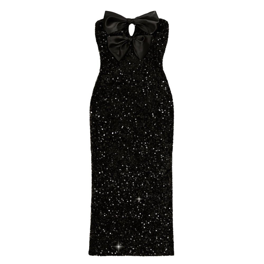 Black Kouvr glitter dress with a large bow on a white background