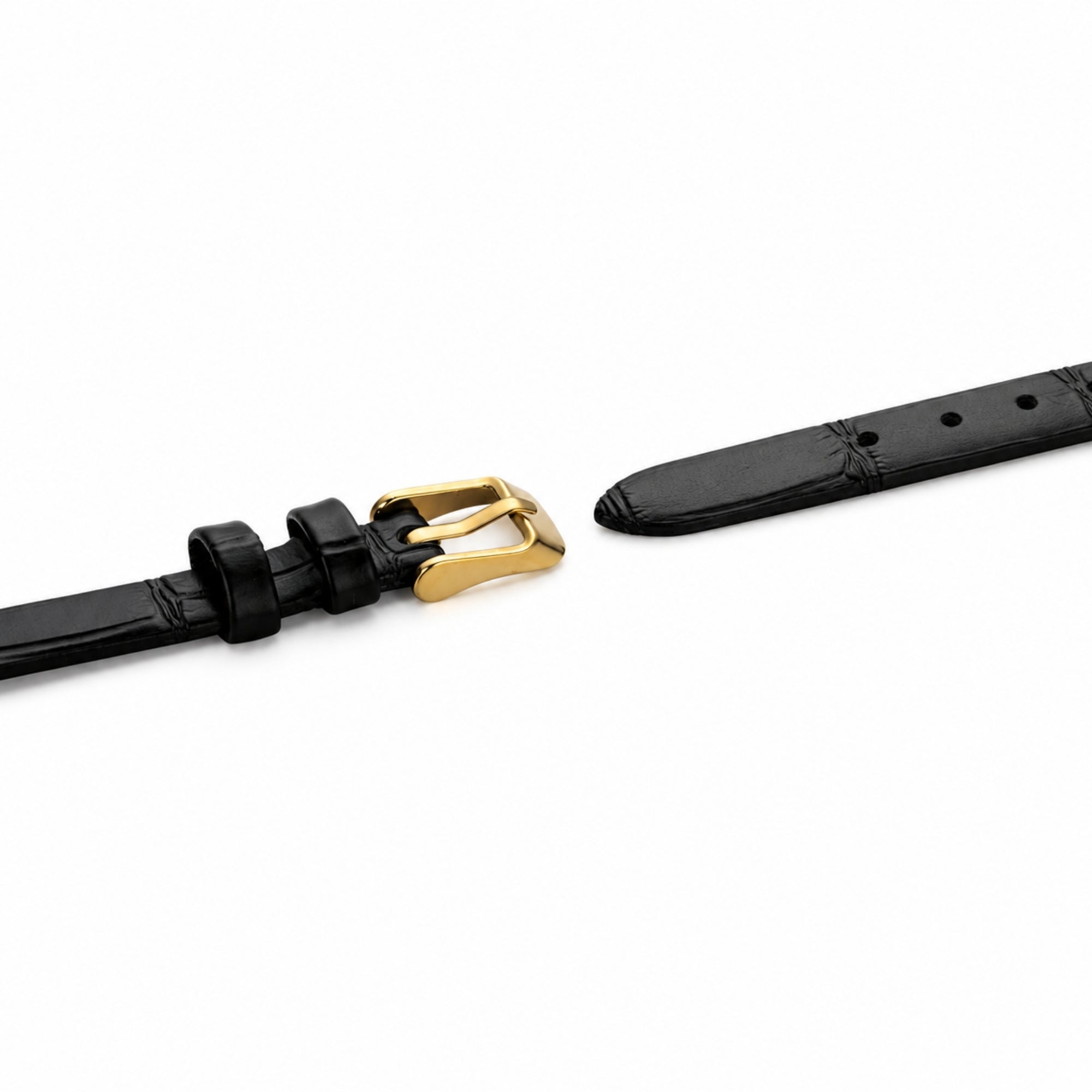 Close up of genuine black leather watch strap with textured finish and secure gold-toned buckle closure
