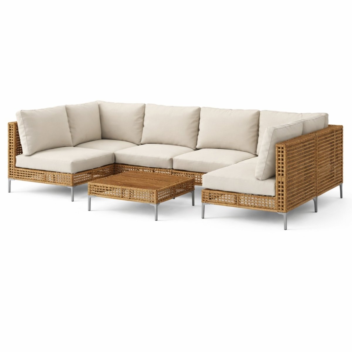 Beige cushions on a luxury u-shape patio furniture set with woven coffee table isolated on white
 