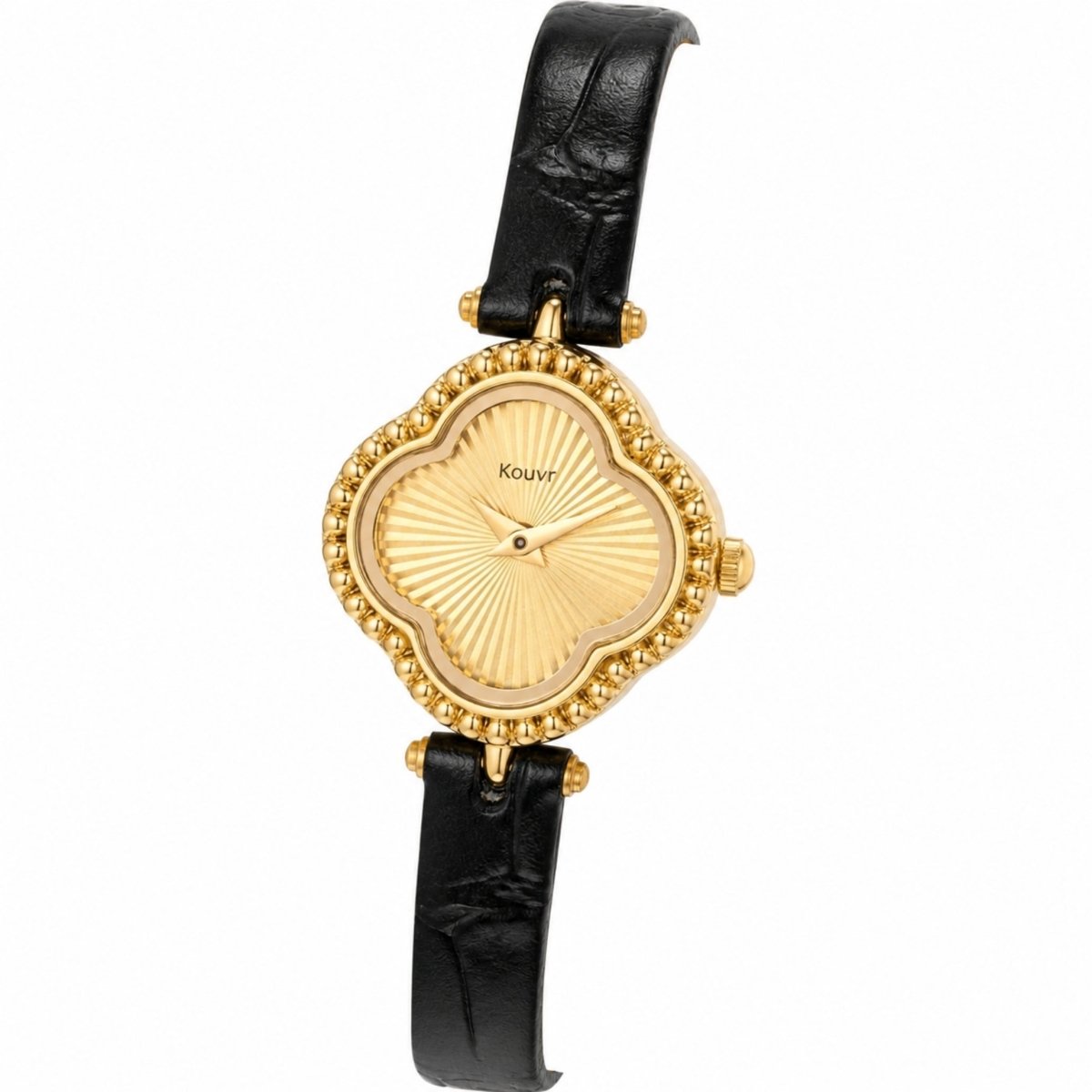 Angled close-up of the Kouvr gold vintage watch highlighting the delicate beaded bezel and the textured black leather strap details.