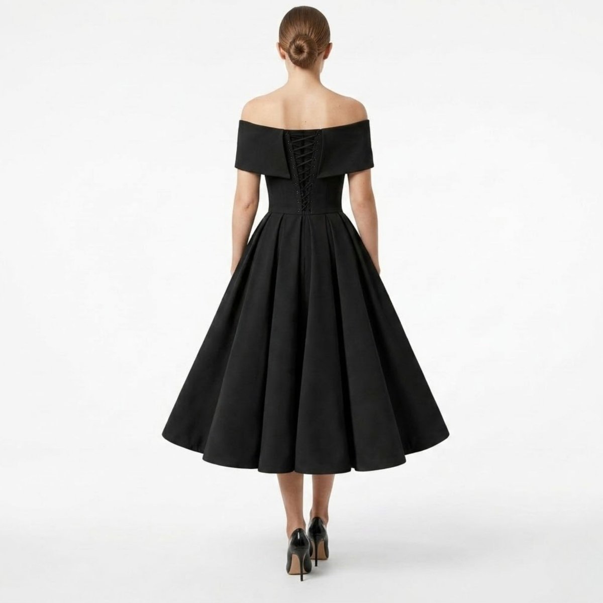 Back view of a black formal midi dress highlighting the intricate lace-up corset back detail