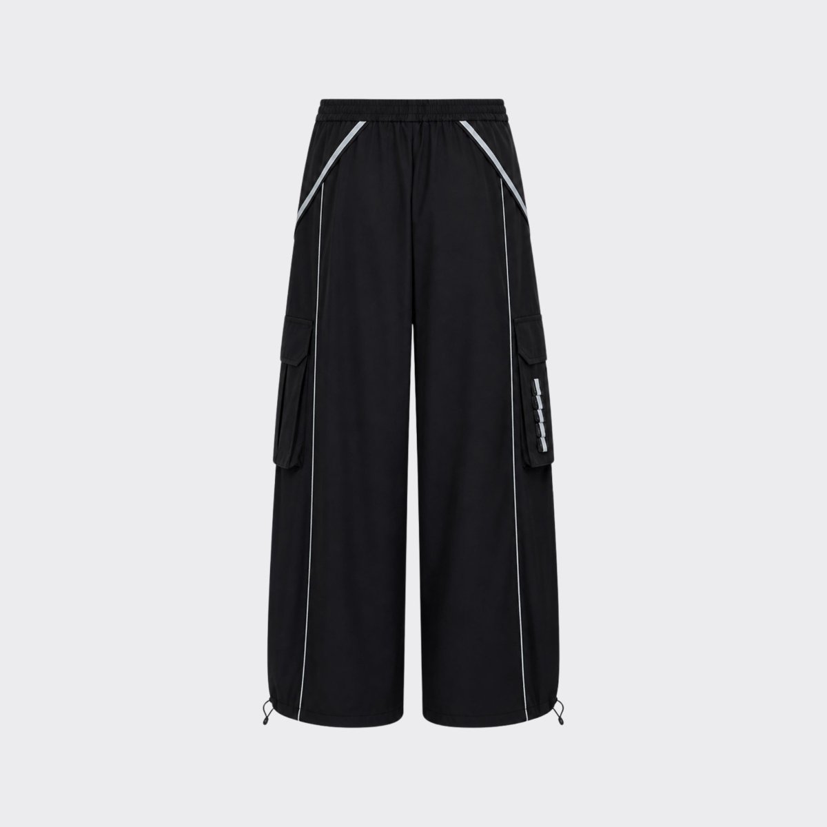 Flat lay back view of black wide leg utility trousers highlighting seam construction and relaxed drape