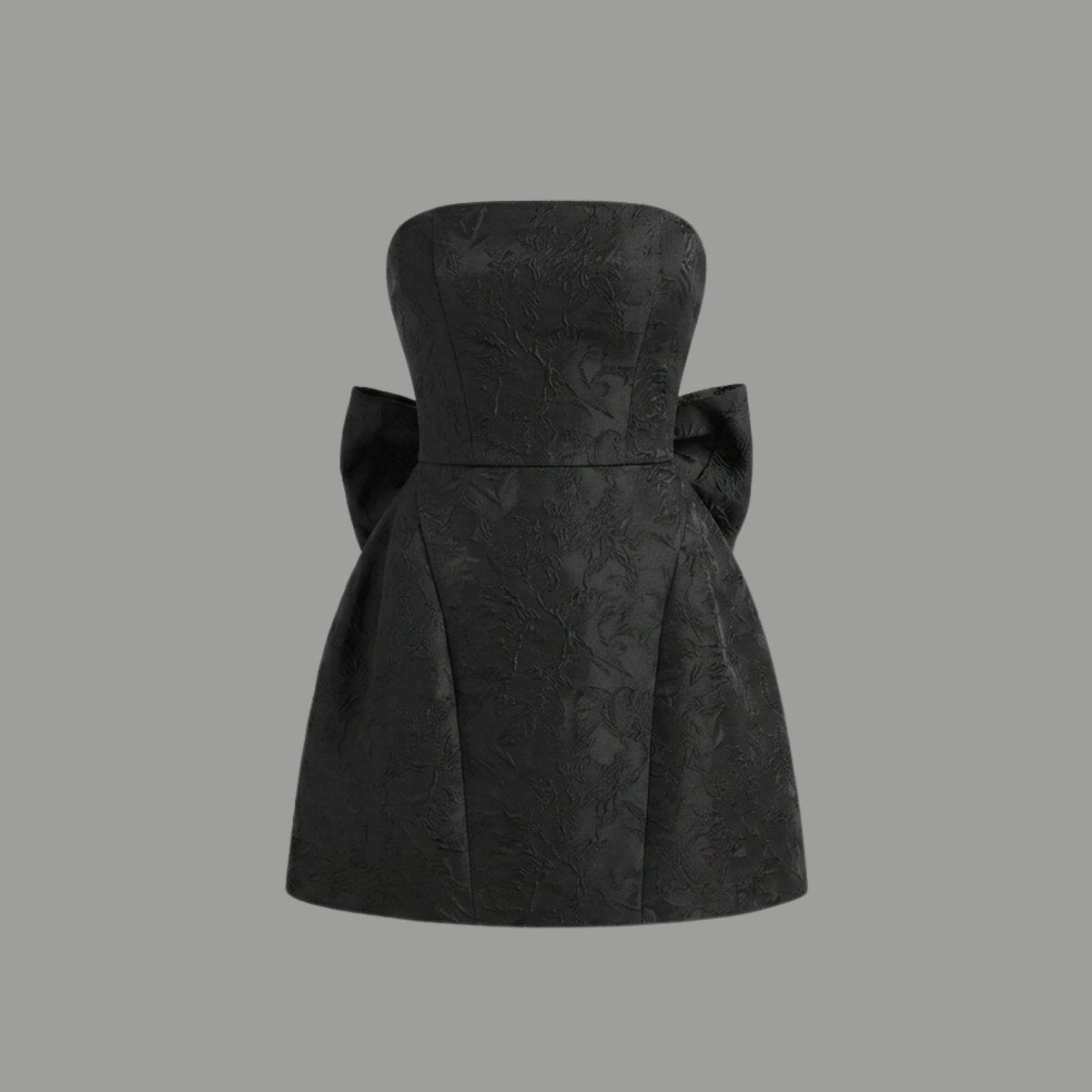 Ghost mannequin front styling of a black strapless party dress with A-line skirt and textured fabric.