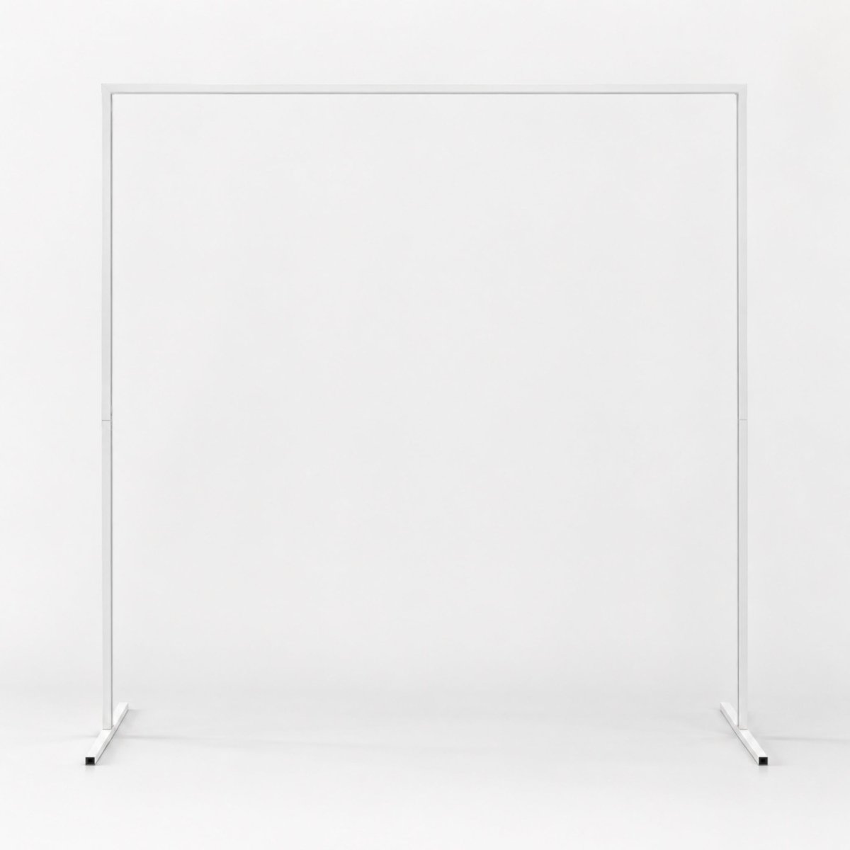 Clean studio view of the minimalist white metal square backdrop stand showcasing its modern lines and durable flat base.