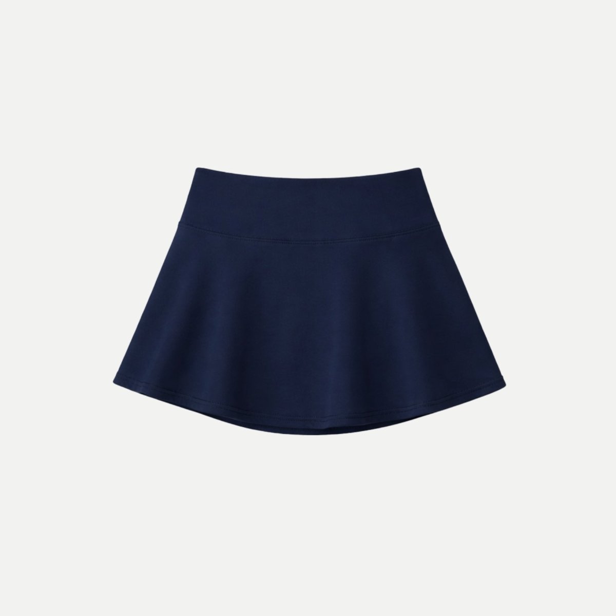 Back product view of Kouvr blue athletic mini skirt highlighting clean lines and premium fabric composition.