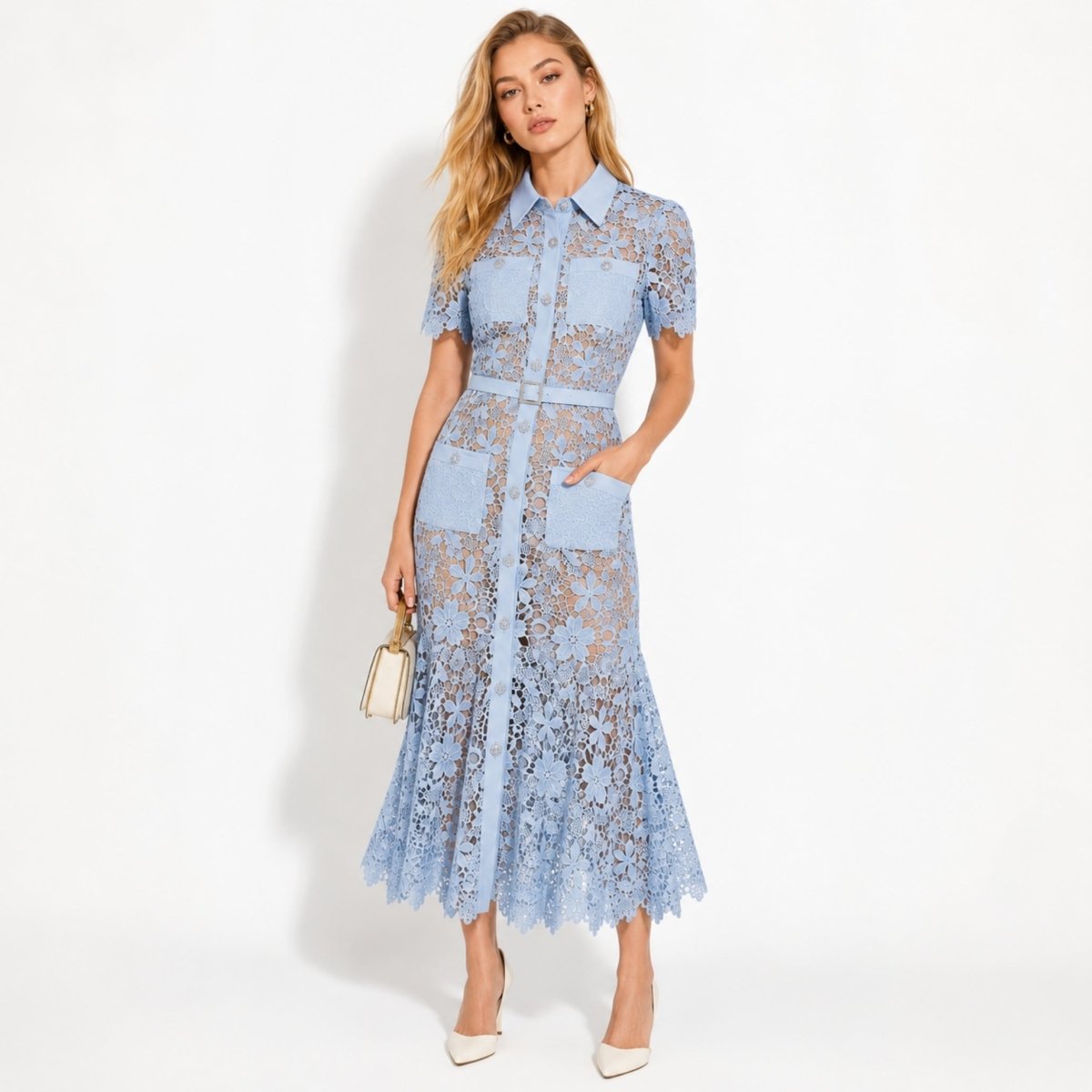 Woman wearing a blue floral lace midi shirt dress with short sleeves and belt.
