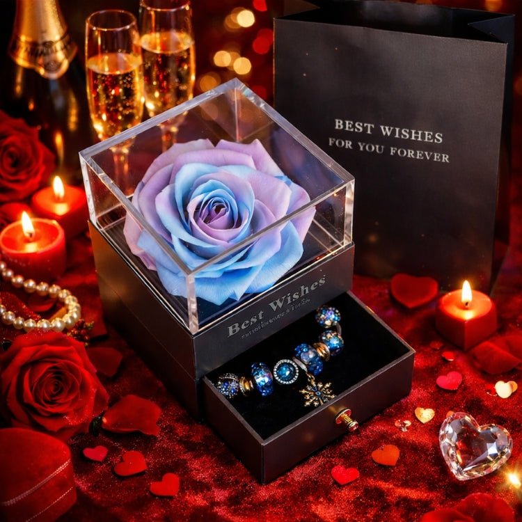 Gradient blue and lavender preserved rose gift set with a hidden charm bracelet drawer.