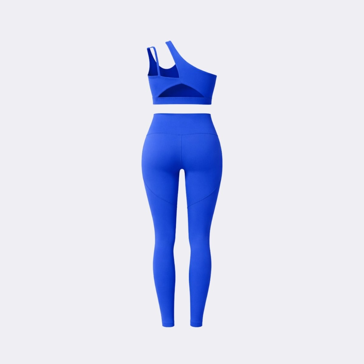 Flat lay back view of Kouvr dark blue one shoulder activewear set highlighting sports bra back cutouts and legging structural seams.