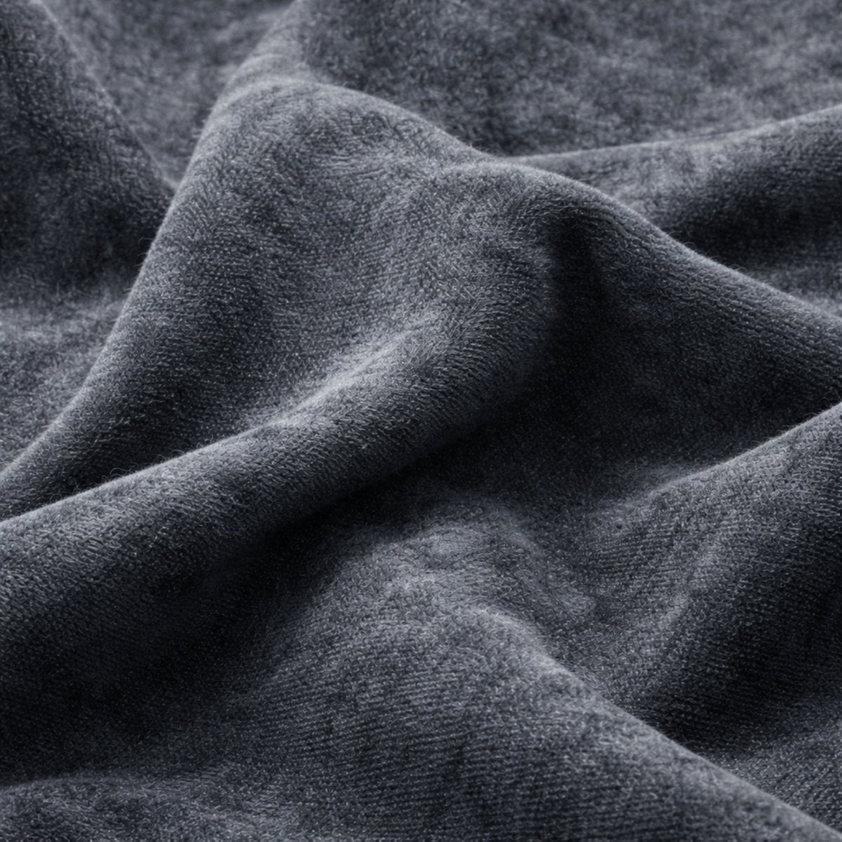 Detail shot of deep sectional corner base and thick back cushions