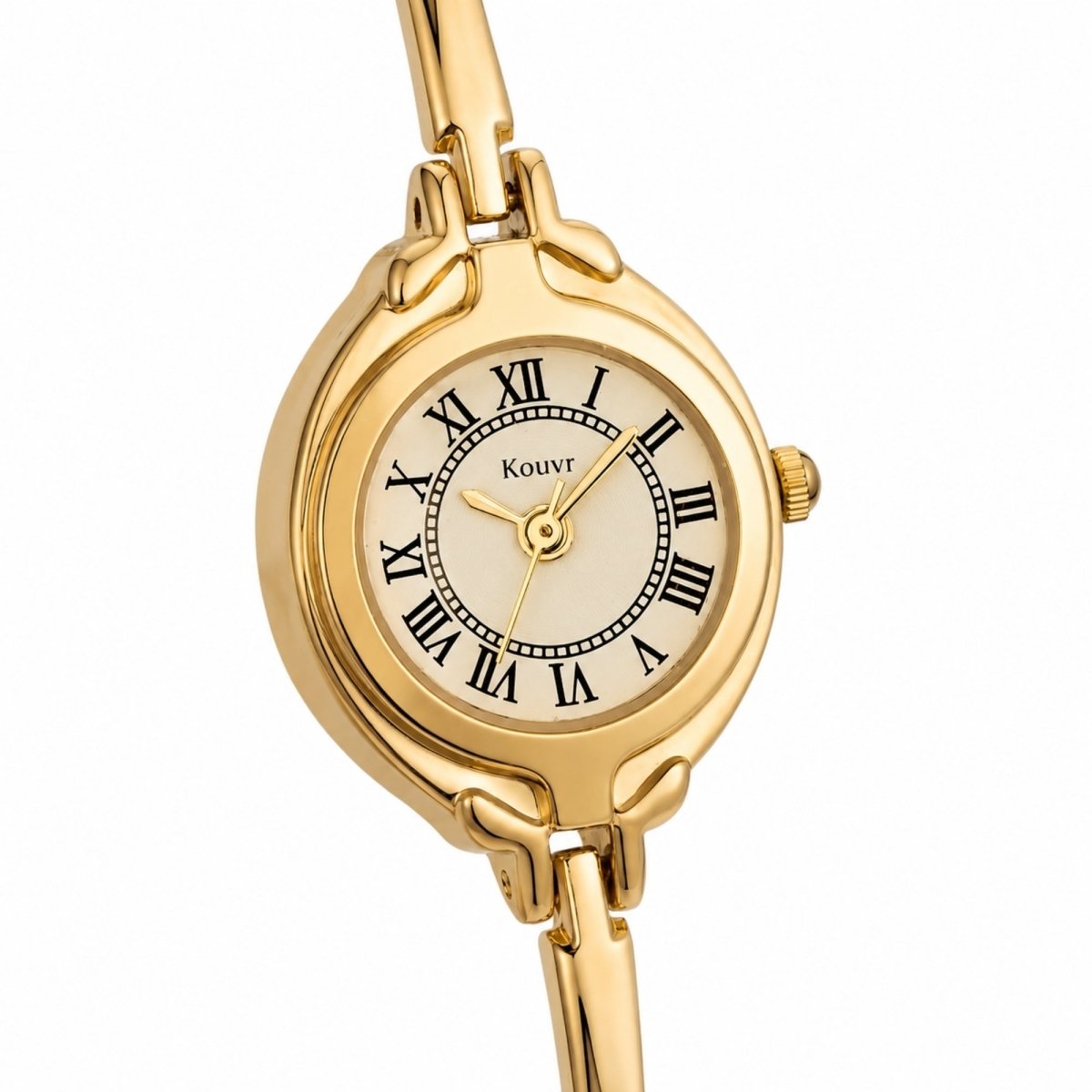 Close up angled view of a polished gold-tone women's watch dial showing detailed vintage design elements and the Kouvr brand logo.