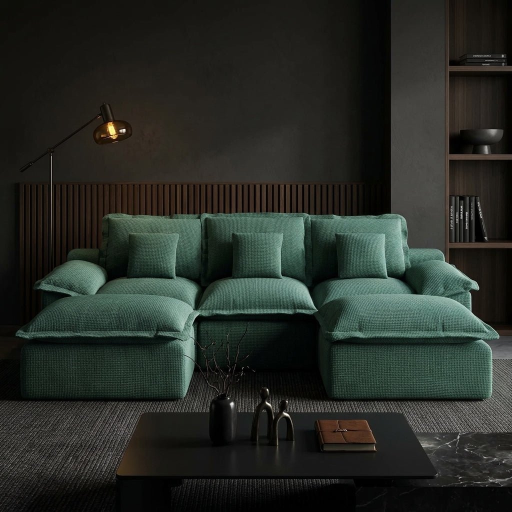 Emerald green modular pit sofa in a home setting showing the deep seats and textured fabric near unboxing cartons.
