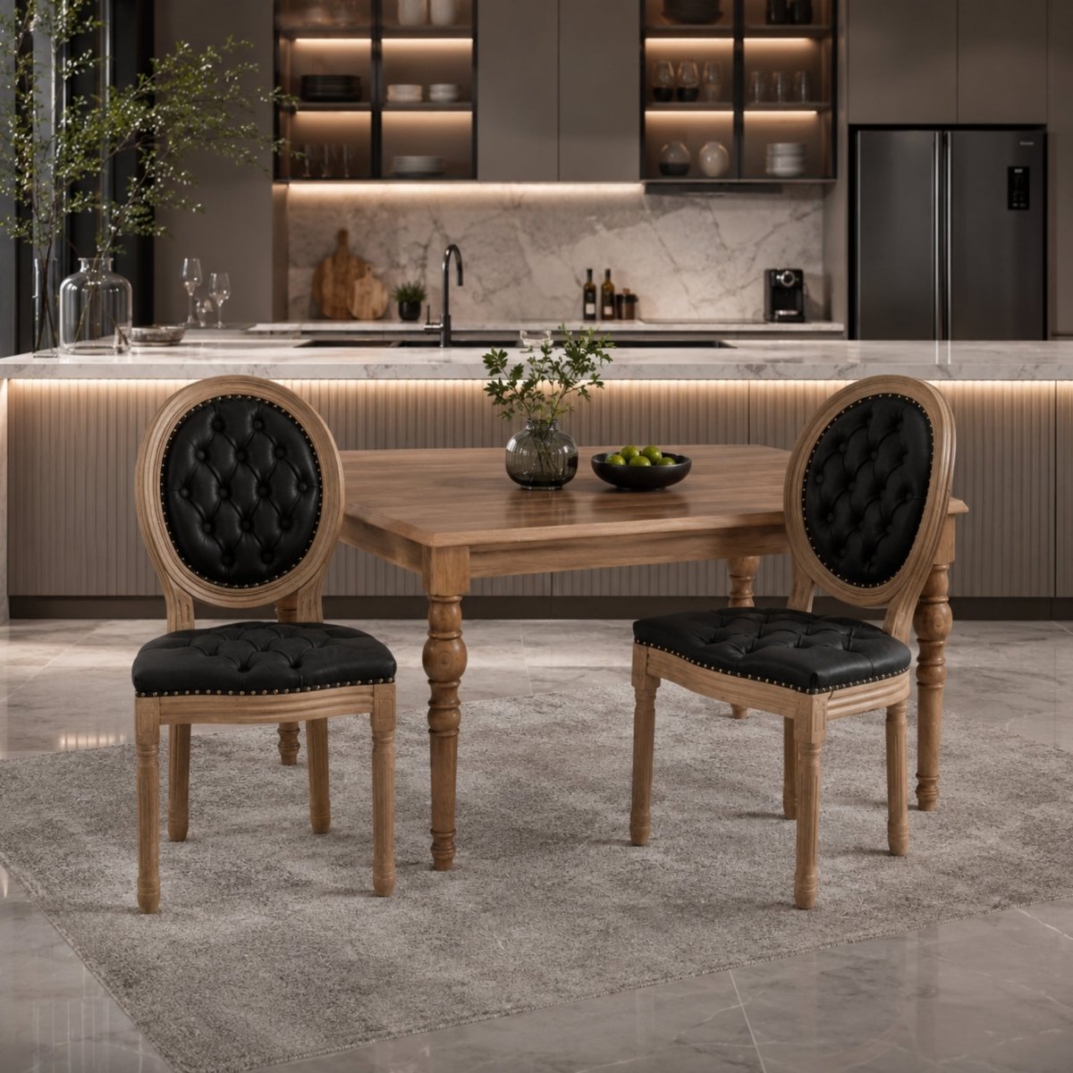 Front view of the Kouvr Châteaux Vintage French Country dining chair featuring black tufted leather, a round medallion back, and natural solid wood fluted legs in a luxury modern kitchen setting.