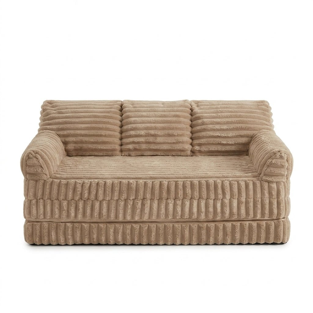 Front view of the plush Kouvr corduroy floor chair featuring three supportive backrest cushions and soft ribbed texture.