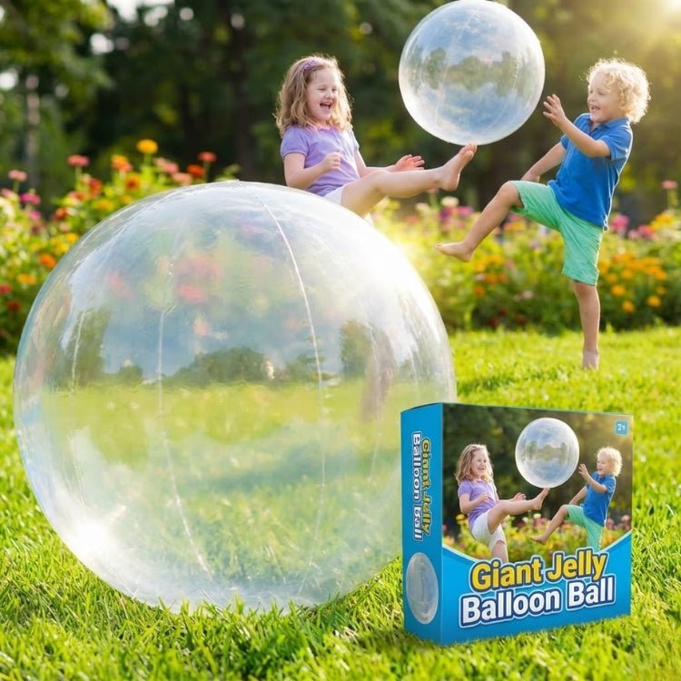 Kids playing with a giant bubble ball in a garden next to the Giant Jelly Balloon Ball retail packaging box.