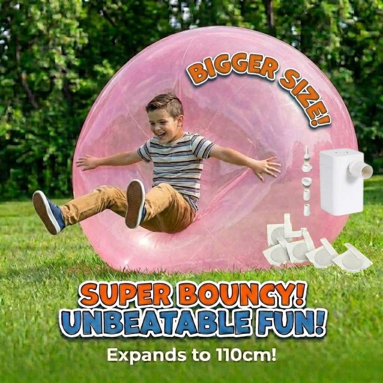 Pink giant inflatable bubble ball displayed on a lawn with a white electric pump and accessories, featuring a buy one get one free offer.