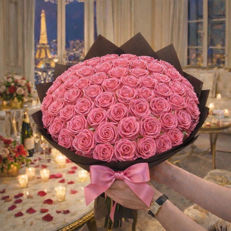 A huge, spherical bouquet of pink sparkle roses held in a romantic Parisian night setting, perfect for a proposal gift.