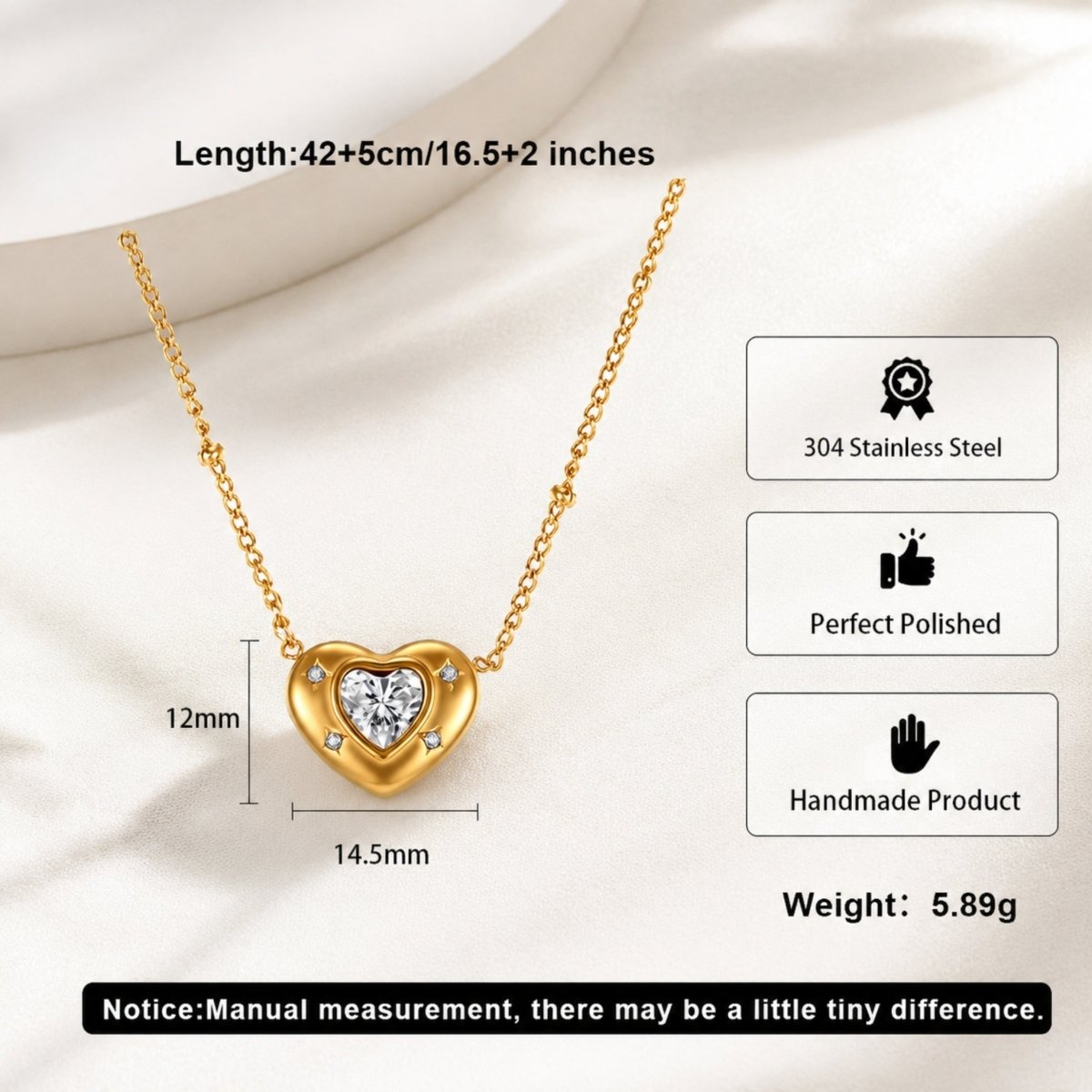 Technical details of the Kouvr gold heart necklace showing 16.5 plus 2 inch chain length, 14.5mm pendant width, and 5.89g weight.